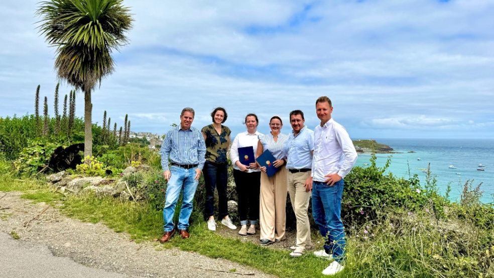 Poynton Bradbury Architects directors celebrate thier employees' success. Directors Simon Burgess and Laura Highton with Justina Naruseviciute and Caroline Stephens and fellow directors Cian Spowart and Chris Turner.